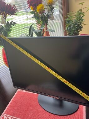 J: Black flat screen monitor - 25” hdmi compatible